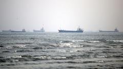 Tanker hit by multiple projectiles in Gulf off Qatar, maritime agency says